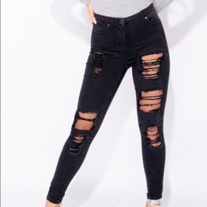Distressed Mid Rise Skinny Jeans